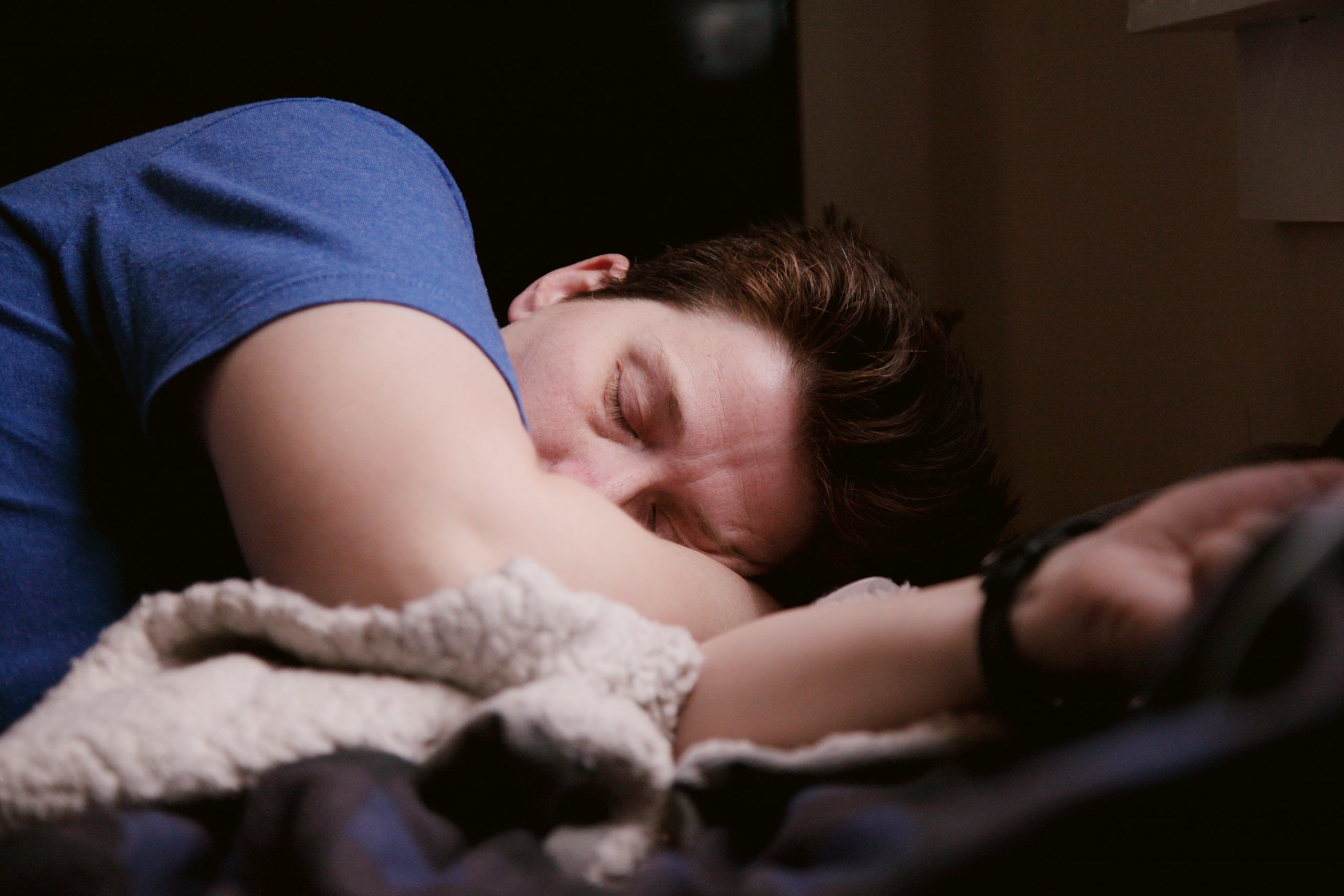 Are you dealing with Sleep Apnea? woman in blue shirt lying on bed