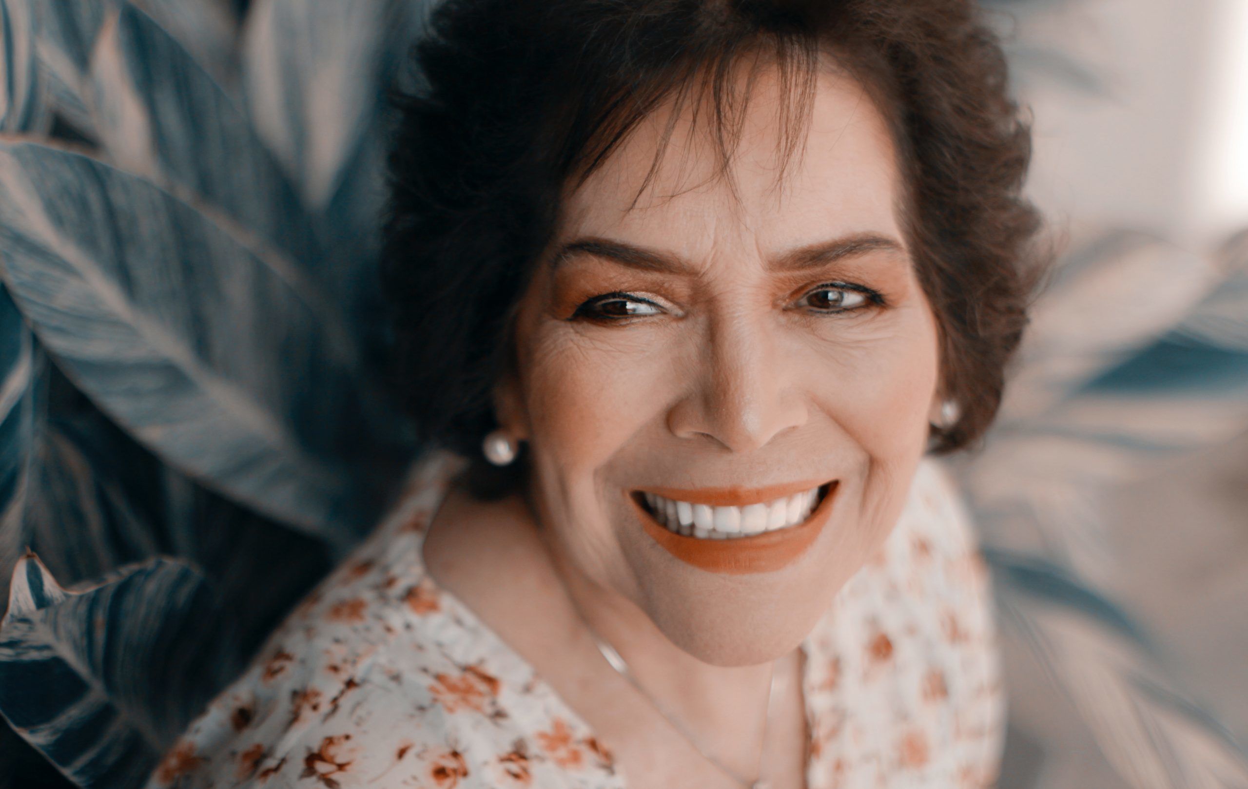 Which Age Group in the UK is Most Likely to Get Their Teeth Whitened? woman's face