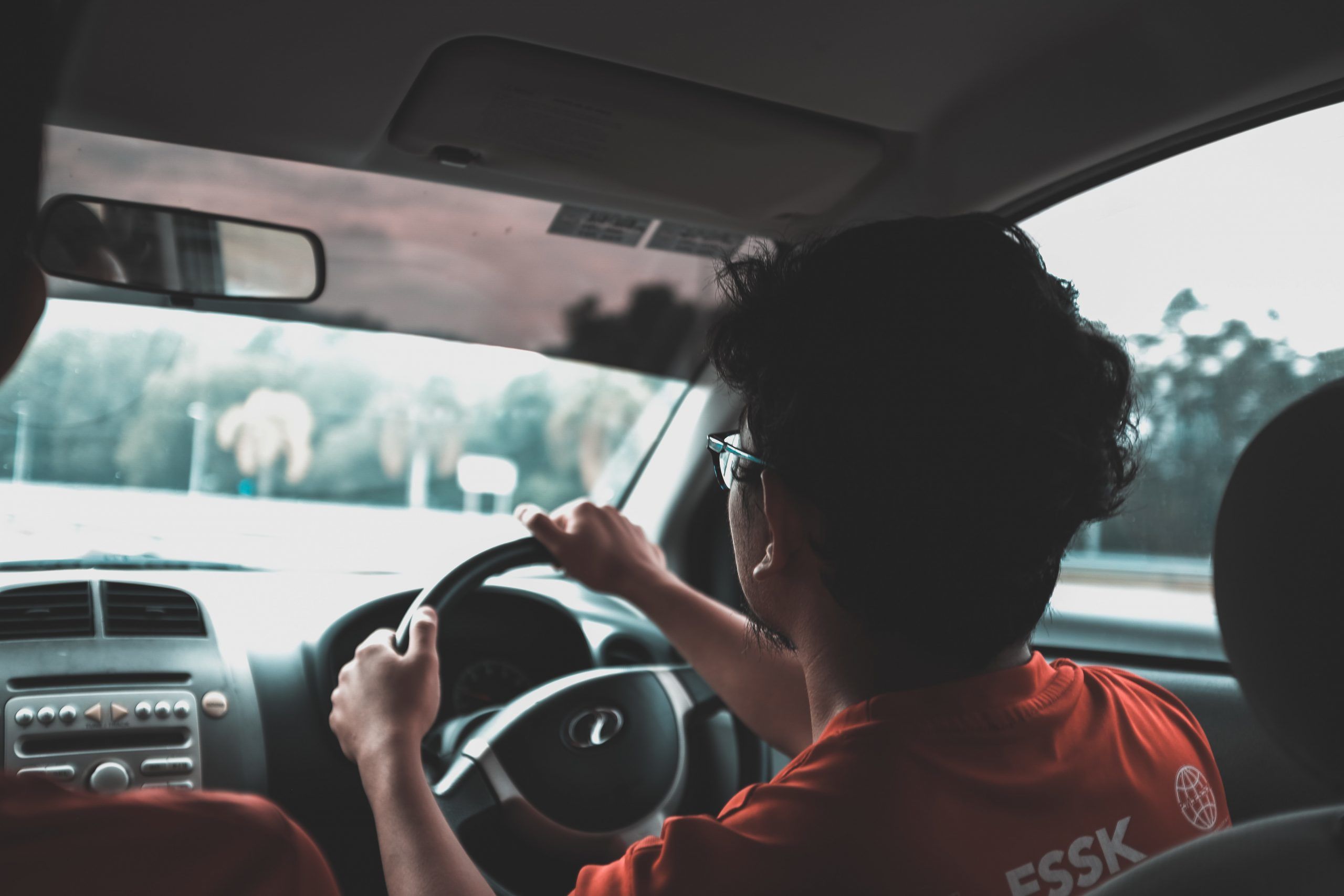 Preparing for Your Driving Theory and Practical Test man driving car