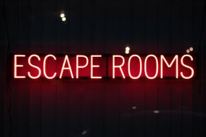 red escape rooms neon sign