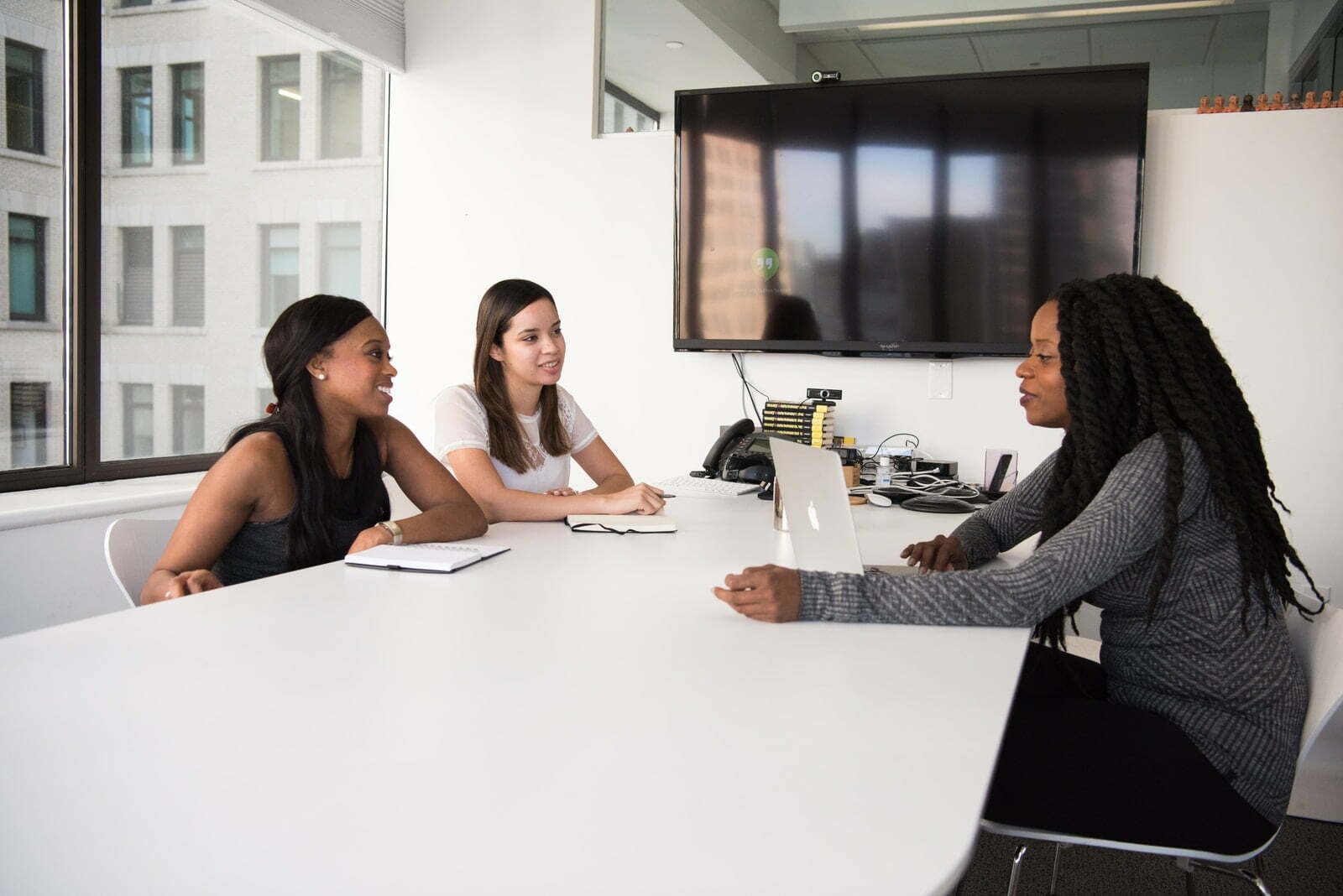 5 Negotiation Tips All Entrepreneurs Can Use According to Entrepreneur Brian Colpak three women sitting at the table