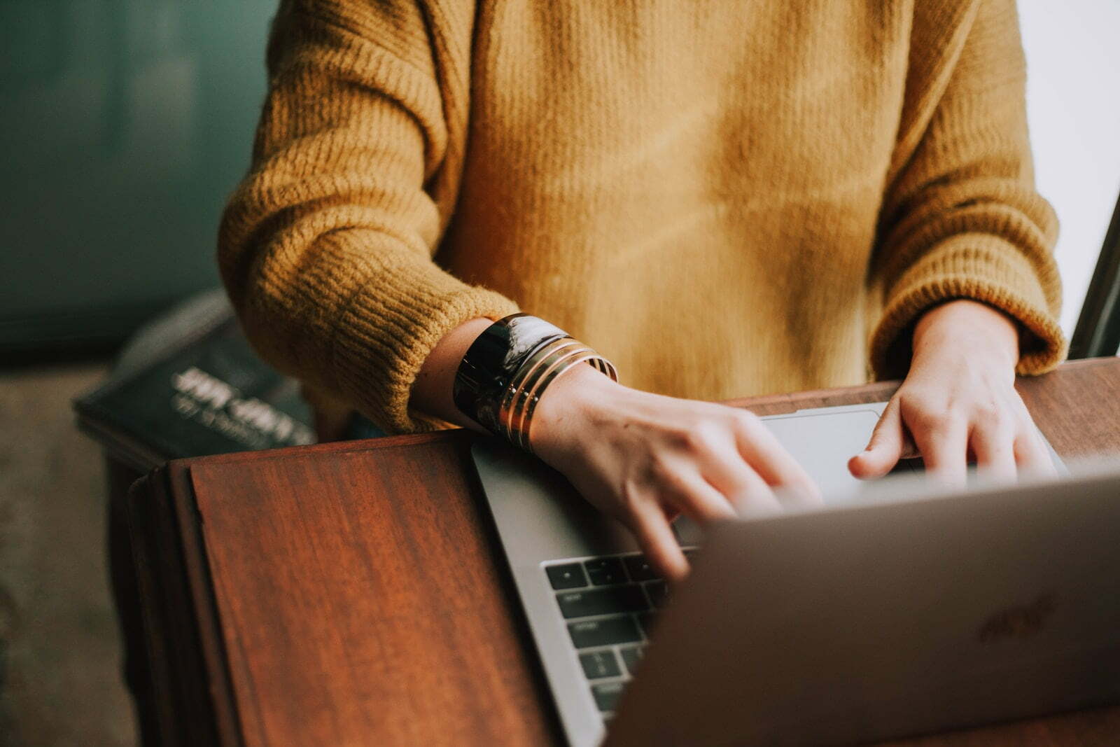 5 ways to optimize HR processes person using laptop computer