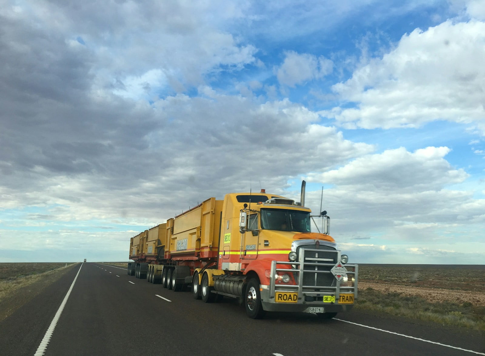 Overcoming Challenges in HGV Training: A Developmental Perspective truck on highway during daytime