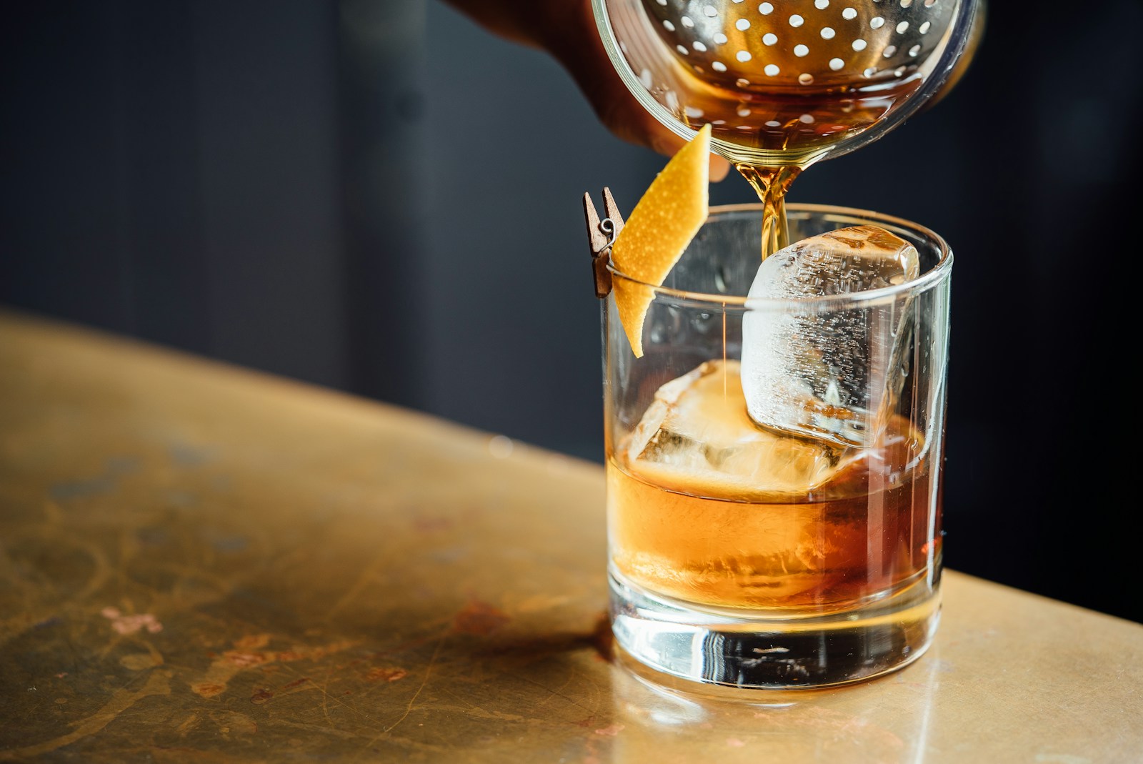 How Much Alcohol is Too Much? Problem Drinking Defined? liquor pouring on clear shot glass