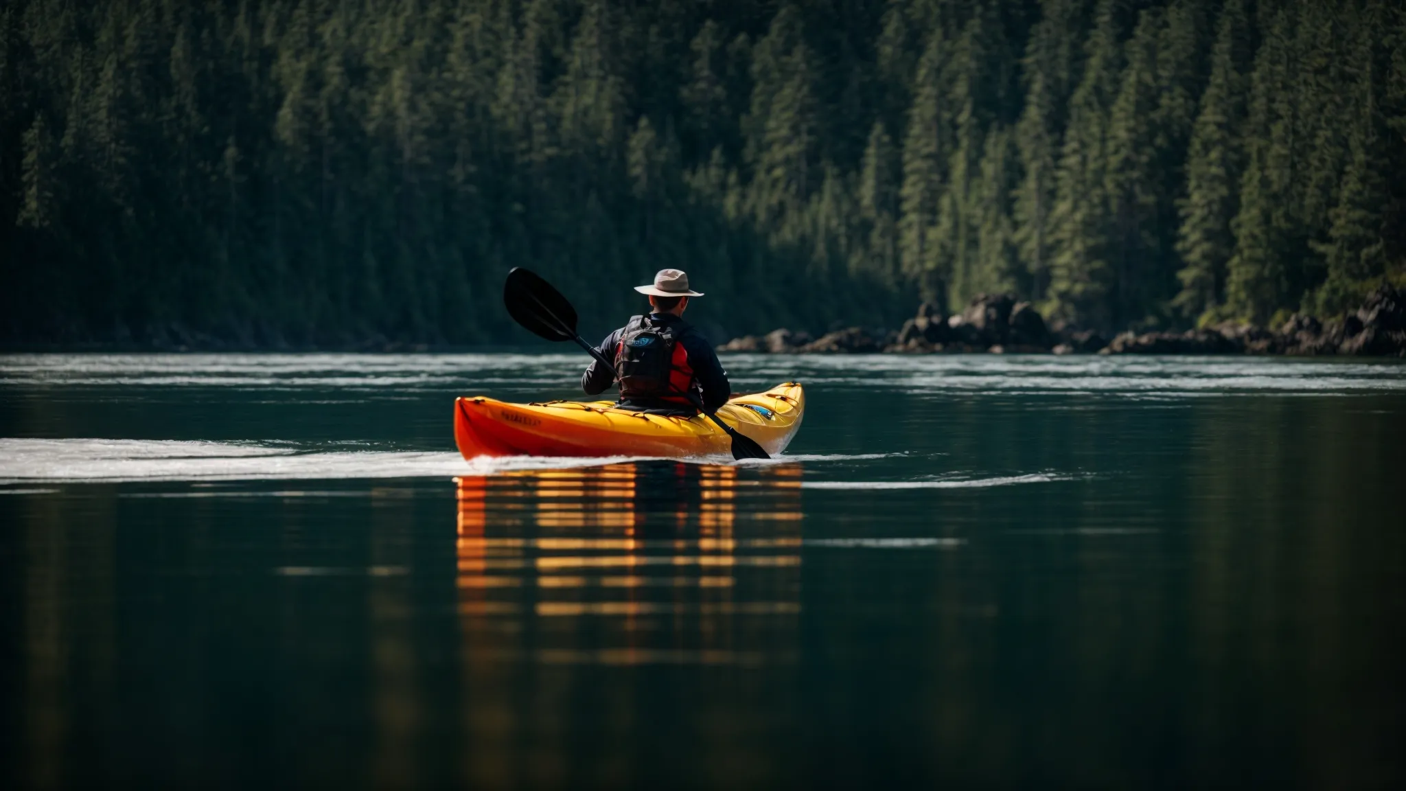 Discover the Beauty of Vancouver Island: Nanaimo Bound _users_7dd1dc79-7cb9-40c2-b5f8-d0e040fa311b_generations_916a9cb2-eb7b-4bbb-95f6-c4e5809283c2_Default_a_kayaker_glides_through_the_calm_waters_near_nanaimo_0
