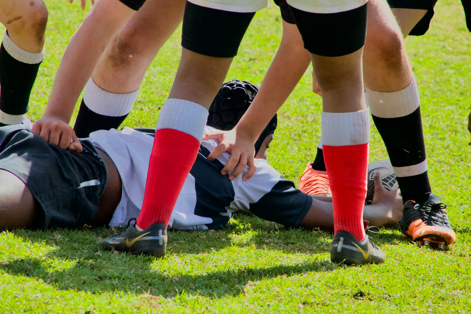 Overcoming Injuries: How Recovery Fuels Growth in Both Sports and Life a group of people in a rugby match