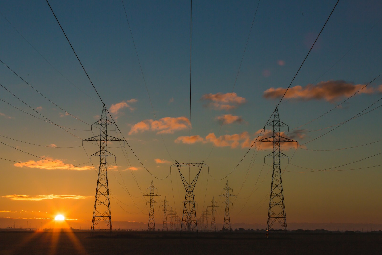 Simple Ways to Save Money on Your Energy Bill photo of truss towers