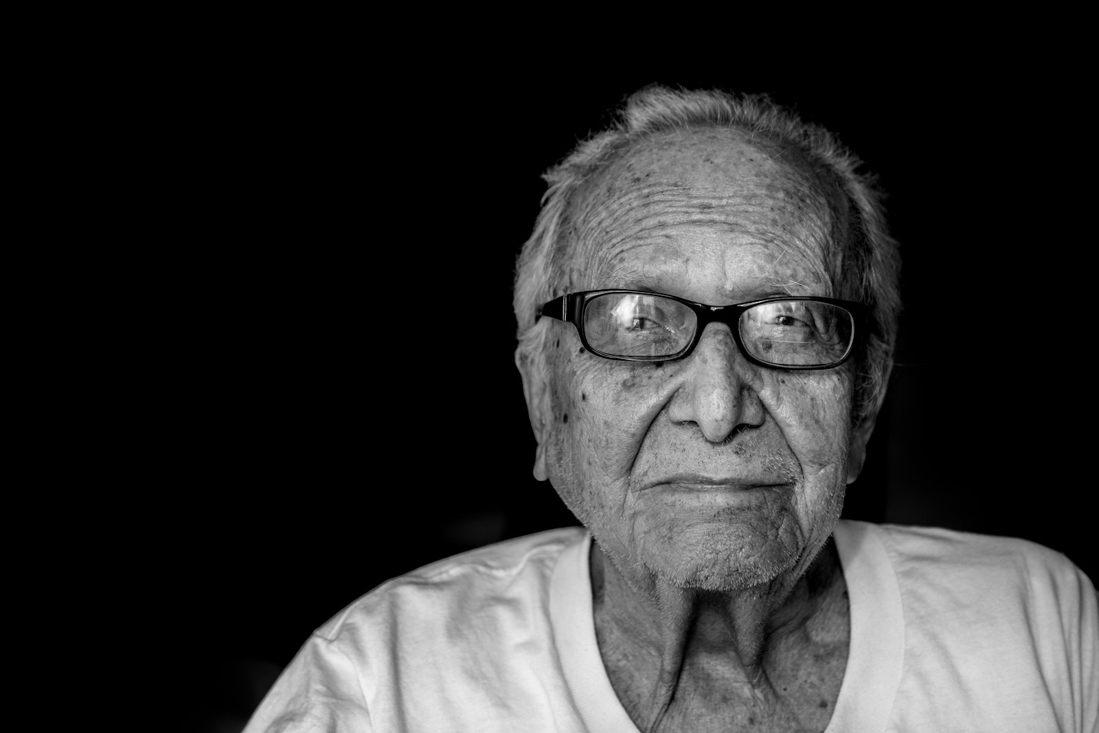 How to Remain Stimulated When Living with Dementia grayscale photography of man wearing shirt and eyeglasses