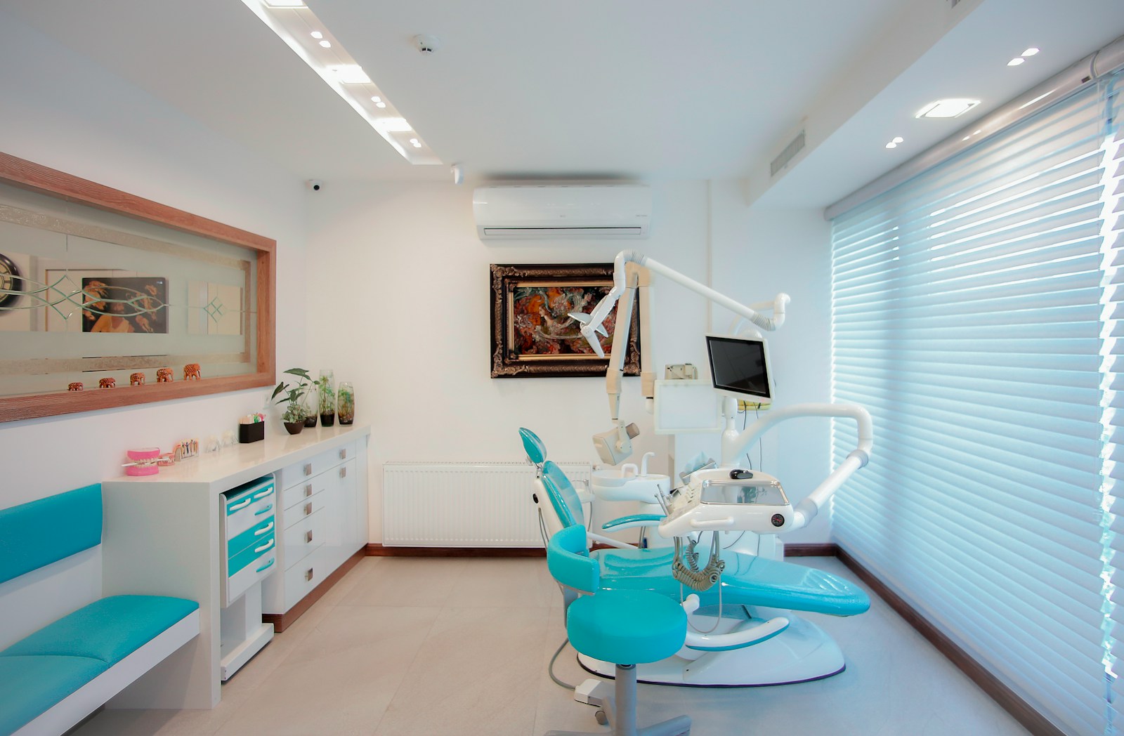 How General Dentistry Provides Complete Care Under One Roof white and blue hospital bed