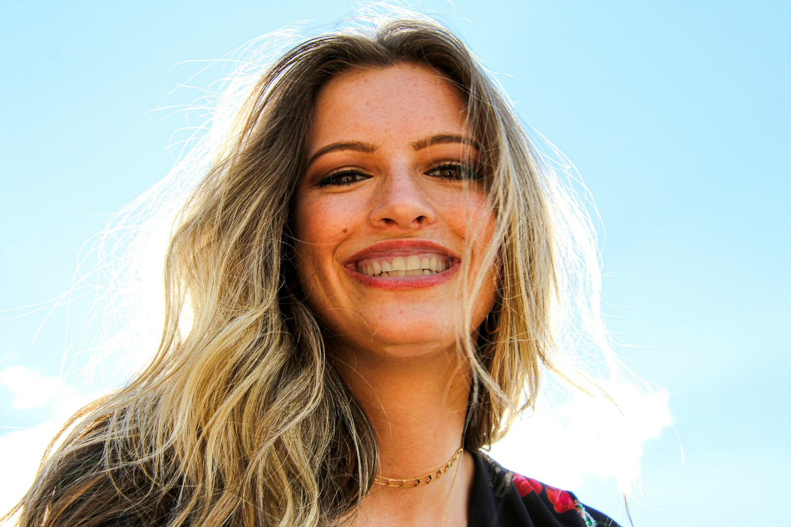 3 Cosmetic Dentistry Services That Deliver Natural, Subtle Smile Improvement womna's face