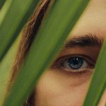 Eye Contact Communication A close up of a person with blue eyes